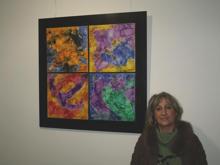 Novais, en la inauguración de la exposición en "Espacio Cultura", de Espacio Coruña. Detras su obra "Lodos" óleo s/lienzo 100 x 100 cm. Enero 2012