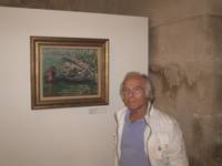 El pintor Avelino Castro, junto a su obra "Barca vella", en la inauguración de la exposición. Ferrol marzo, 2012.
